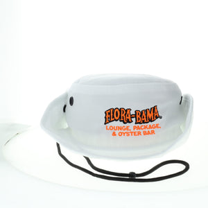 A white bucket hat with the Flora-Bama lounge, package, and oyster bar logo in orange and black on the front.