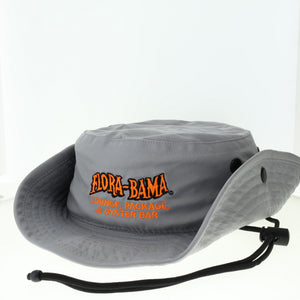 A dark grey boonie hat with the Flora-Bama lounge, package, and oyster bar logo in orange and black on the front.