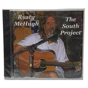 CD cover featuring a man singing with a guitar, titled 'The South Project' by Rusty McHugh.