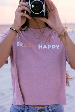 cropped pink tee with beach happy text across front