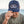 Man wearing a blue cap with 'United States of America 250 Years' 