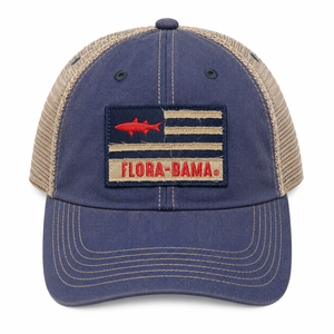 blue flora bama cap with a flag and mullet patch