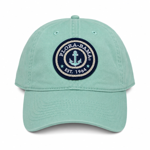 Light blue cap with Flora-Bama  in a circle with anchor