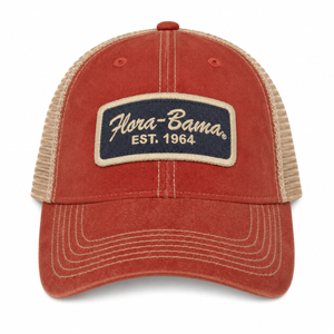 red hat with blue patch and tan flora bama text