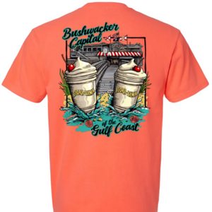Coral t-shirt with a graphic design of two bushwackers and the flora bama buidling  on the back 