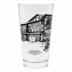 Clear glass with black and white illustration of a building and text on a white background