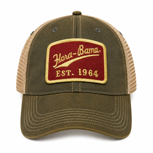 Green and brown trucker cap with Flora-Bama logo on a red patch
