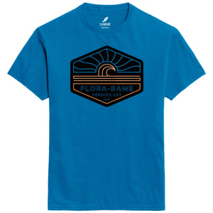 A blue t-shirt with a graphic wave print on the front that includes the text 'FLORA-BAMA' 
