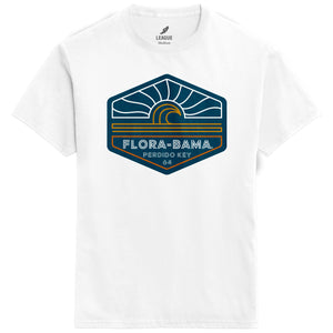 A white t-shirt with a graphic wave print on the front that includes the text 'FLORA-BAMA' 