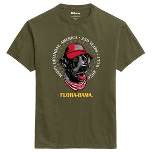 Olive green t-shirt with a graphic of a black dog wearing a red cap and bandana, and text 'Flora-Bama' 