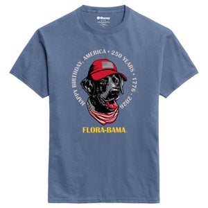 Blue t-shirt with a graphic of a black dog wearing a red cap and bandana, with text around it and flora-bama across the bottom