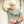Man wearing a 'Flora-Bama' camo tshirt with black flora bama logo, white flora bama hat with camo bill and yellow logo