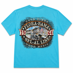 blue shirt with oval design and buidling with motorcycles in the center