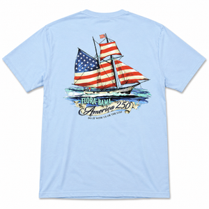 Light blue t-shirt with a sailboat design featuring an American flag on a white background