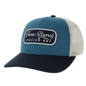 blue hat with black bill, white mesh back and black patch on the front with flora bama script font in white