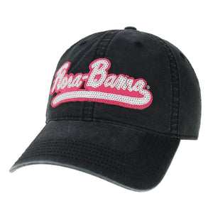 A black baseball cap with 'Flora-Bama' written in pink sequins on the front.