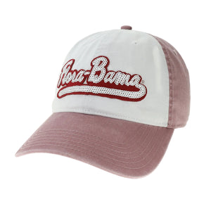 A white and pink baseball cap with 'Flora-Bama' written in red sequins on the front.
