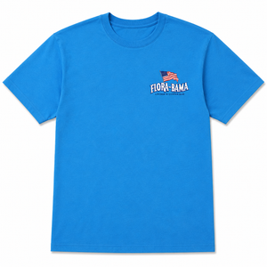 Blue t-shirt with 'Flora-Bama' logo and American flag on a white background