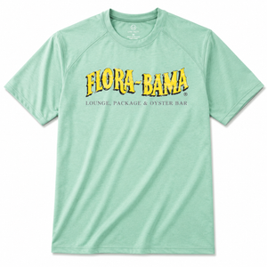 Light green t-shirt with yellow 'Flora-Bama' logo on a white background