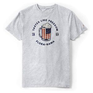 heather gray short sleeve shirt with red white and blue beer mug and flora bama text in a circle around mug