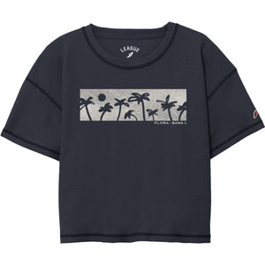 A navy colored crop crew t-shirt with a waffle fabric texture and a graphic print of palm trees 