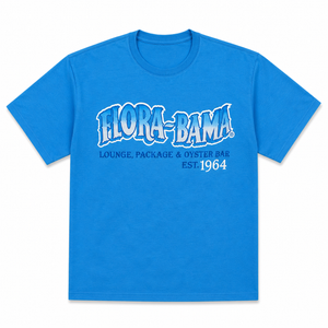 Blue t-shirt with 'Flora-Bama' logo and text on a white background