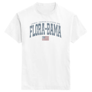 White t-shirt with 'Flora-Bama' text and American flag on a white background
