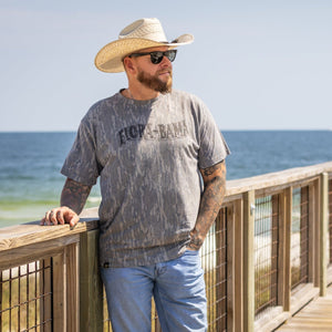 T-shirt with 'Flora-Bama' logo on mossy oak bottomland camo print