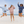 girls jumping in reverse fleece shorts and sweatshirts