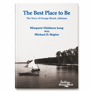 Book cover of 'The Best Place to Be' with a sailboat on a lake and trees in the background.