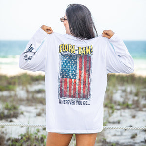 white long-sleeve shirt with 'Flora-Bama' and American flag design