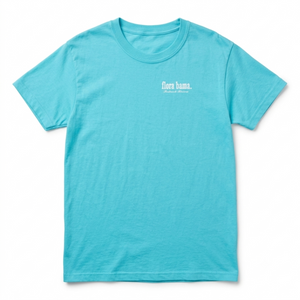Light blue t-shirt with 'Born in the USA' text on a white background