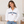 Girl in white quarter zip
