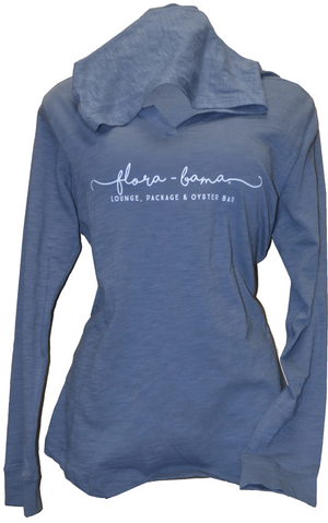 A blue hooded long-sleeved ladies tee with 'Flora-Bama' text printed across the front.