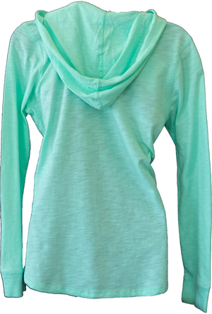 back view of a mint green hooded long-sleeved ladies tee with 'Flora-Bama' text printed across the front.