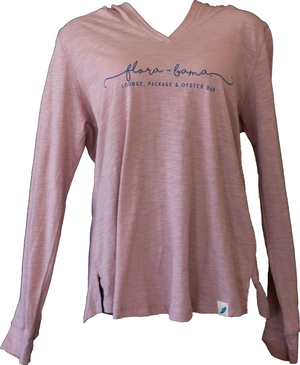 A pink hooded long-sleeved ladies tee with 'Flora-Bama' text printed across the front.