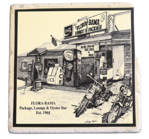 stone coaster with black sketch of old flora bama building